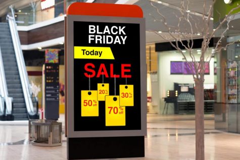 A sign at an empty mall advertises for Black Friday.