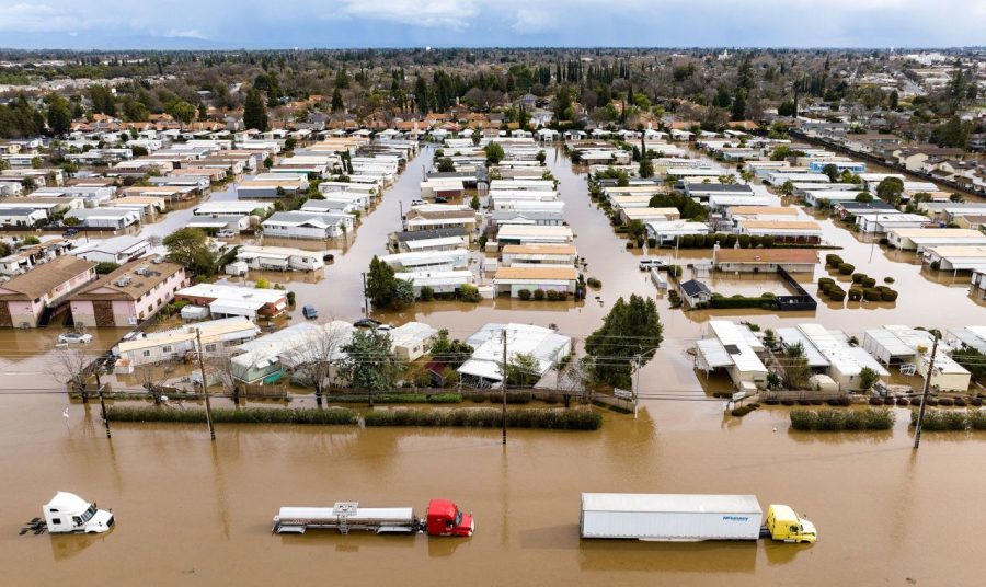 A picture of a suburban neighborhood that has flooded by the recent storms in California.