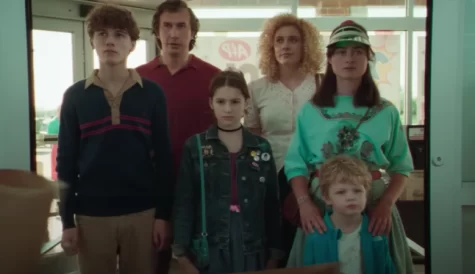 The main cast of the Movie is lined up at the opening of a grocery store.